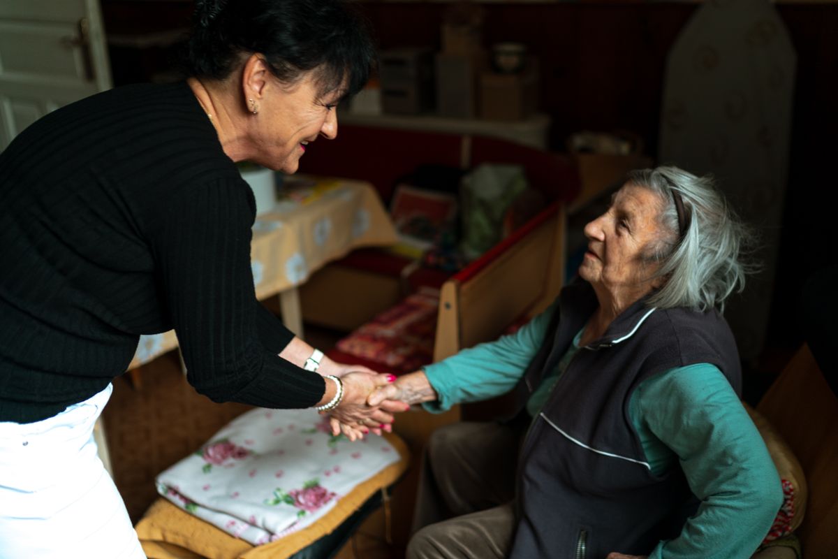 A reassuring connection between a caregiver and an older person